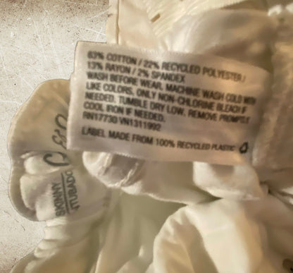 Boost your little one's style and comfort with our Cat & Jack White skinny jeans