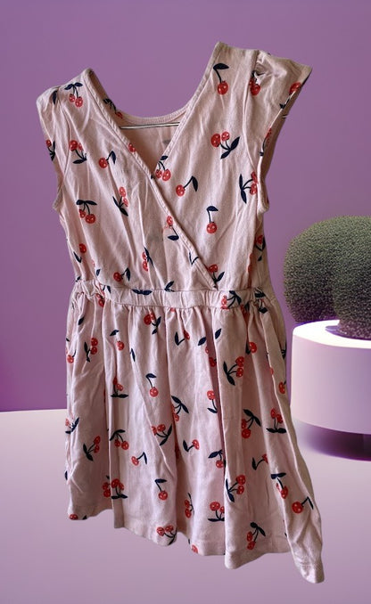 Dress up your little girl in this Carter's playful and colorful cherry design dress