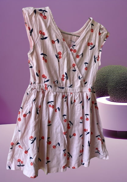 Dress up your little girl in this Carter's playful and colorful cherry design dress