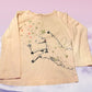 Featuring cute animal designs with glimmering hearts, this Carter's pull over top is perfect for your little fashionista
