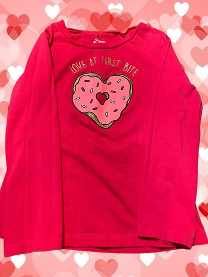 Let your little one sparkle with style in this adorable Oshkosh Originals graphic tee