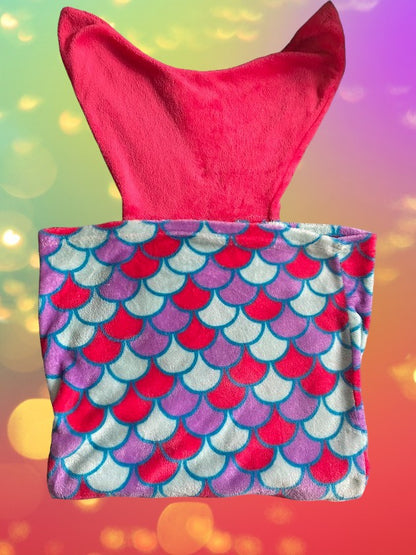 This cozy mermaid design tail blanket has beautiful colors and a fun design