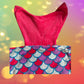 This cozy mermaid design tail blanket has beautiful colors and a fun design