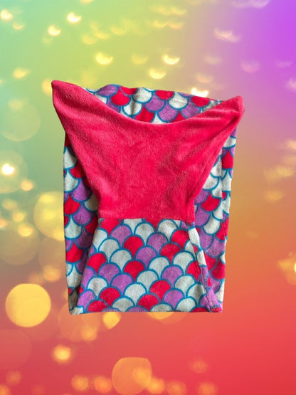 This cozy mermaid design tail blanket has beautiful colors and a fun design