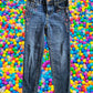 Route 66 distressed floral rhinestone skinny jeans provide a polished and stylish design