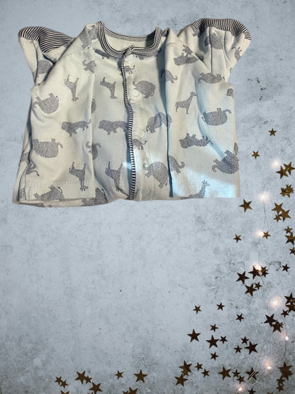 This Little Me Footed Animal Cotton Onesie features a charming powder blue design with animal motifs