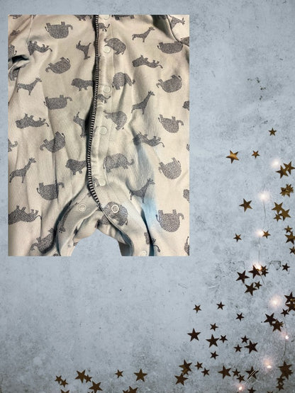 This Little Me Footed Animal Cotton Onesie features a charming powder blue design with animal motifs
