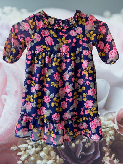 Route 66 floral ruffle dress with vibrant floral designs and elegant ruffled sleeves