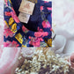 Route 66 floral ruffle dress with vibrant floral designs and elegant ruffled sleeves