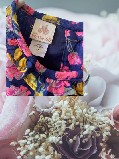 Route 66 floral ruffle dress with vibrant floral designs and elegant ruffled sleeves