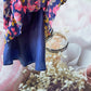 Route 66 floral ruffle dress with vibrant floral designs and elegant ruffled sleeves