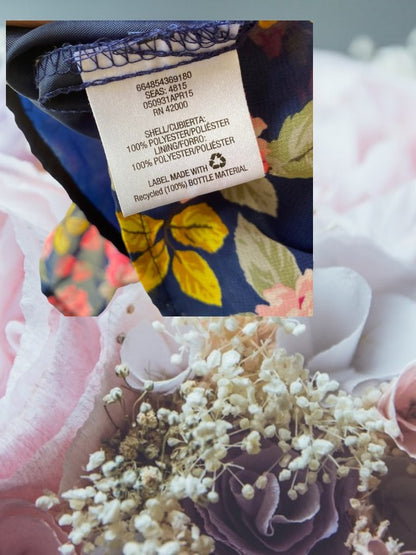 Route 66 floral ruffle dress with vibrant floral designs and elegant ruffled sleeves