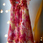 This Blueberi Boulevard dress features a colorful floral design and has flowers around the neckline