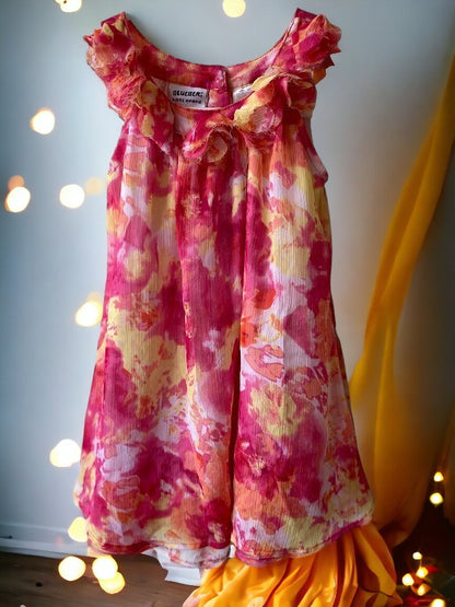 This Blueberi Boulevard dress features a colorful floral design and has flowers around the neckline