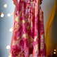This Blueberi Boulevard dress features a colorful floral design and has flowers around the neckline