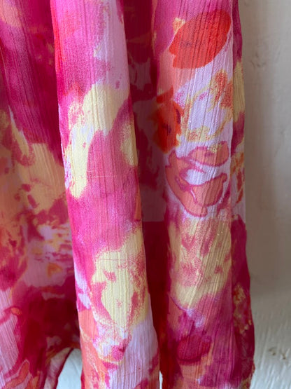 This Blueberi Boulevard dress features a colorful floral design and has flowers around the neckline