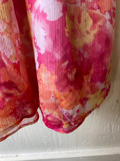 This Blueberi Boulevard dress features a colorful floral design and has flowers around the neckline