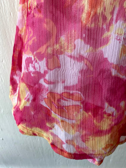 This Blueberi Boulevard dress features a colorful floral design and has flowers around the neckline