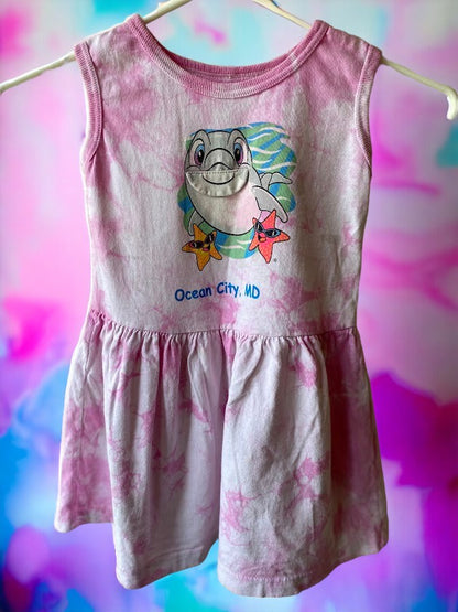 With charming graphics and a chic sleeveless design, this Art On T's dress provides the perfect summer look for your little girl