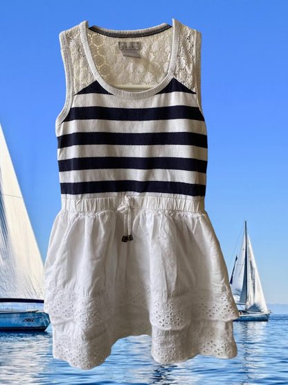 This Tahari's girl's dress boasts a stylish stripe design and a charming ruffle and floral bottom