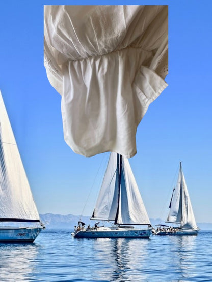 This Tahari's girl's dress boasts a stylish stripe design and a charming ruffle and floral bottom