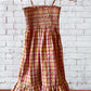 Add a little sparkle and shine to your summer wardrobe with the N.Y.C. girl's cotton tube top dress