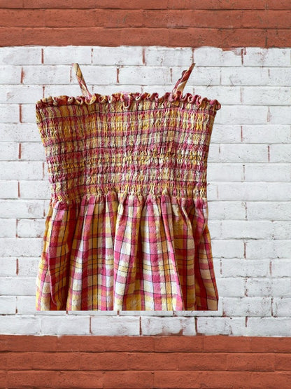 Add a little sparkle and shine to your summer wardrobe with the N.Y.C. girl's cotton tube top dress