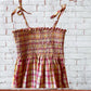 Add a little sparkle and shine to your summer wardrobe with the N.Y.C. girl's cotton tube top dress