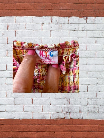 Add a little sparkle and shine to your summer wardrobe with the N.Y.C. girl's cotton tube top dress