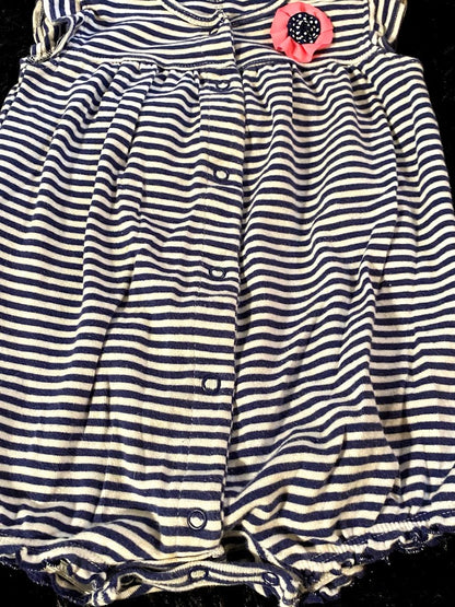 This adorable Carter's Girl Stripe Applique Floral Onesie combines comfort and charm