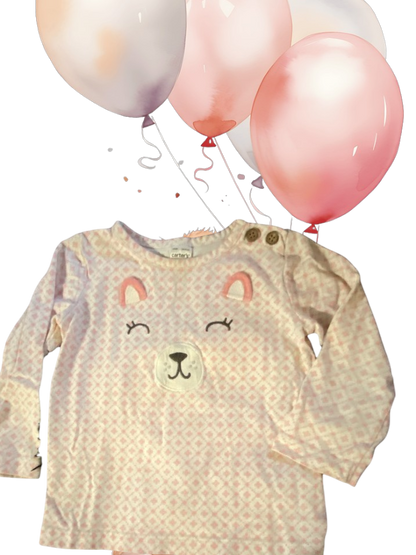 This Carter's long-sleeved top features a pretty applique bear design that's sure to delight your little one