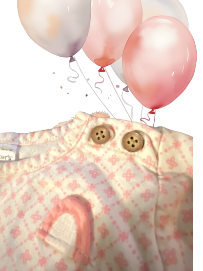 This Carter's long-sleeved top features a pretty applique bear design that's sure to delight your little one