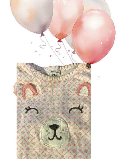 This Carter's long-sleeved top features a pretty applique bear design that's sure to delight your little one