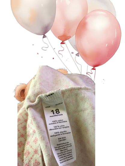 This Carter's long-sleeved top features a pretty applique bear design that's sure to delight your little one