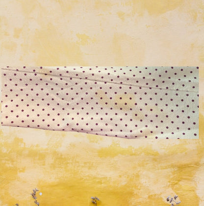 This Wonderkids polka dot long sleeve top is a stylish addition to any toddler's wardrobe