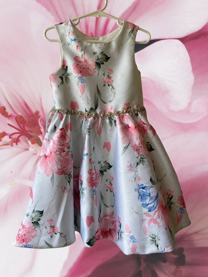 This summer party dress from Rare Editions features a lovely floral design