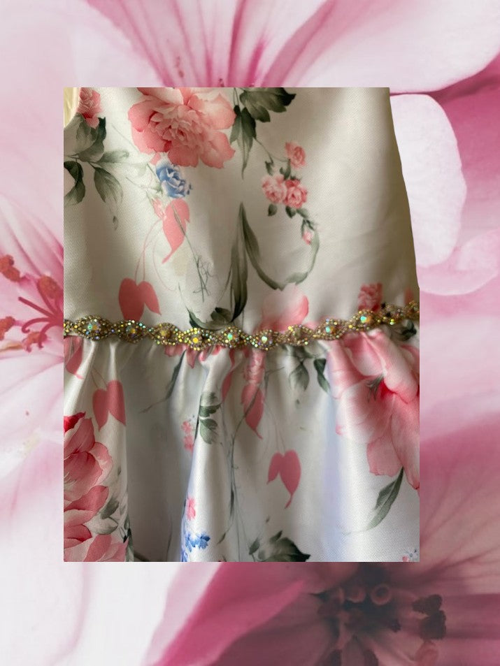 This summer party dress from Rare Editions features a lovely floral design