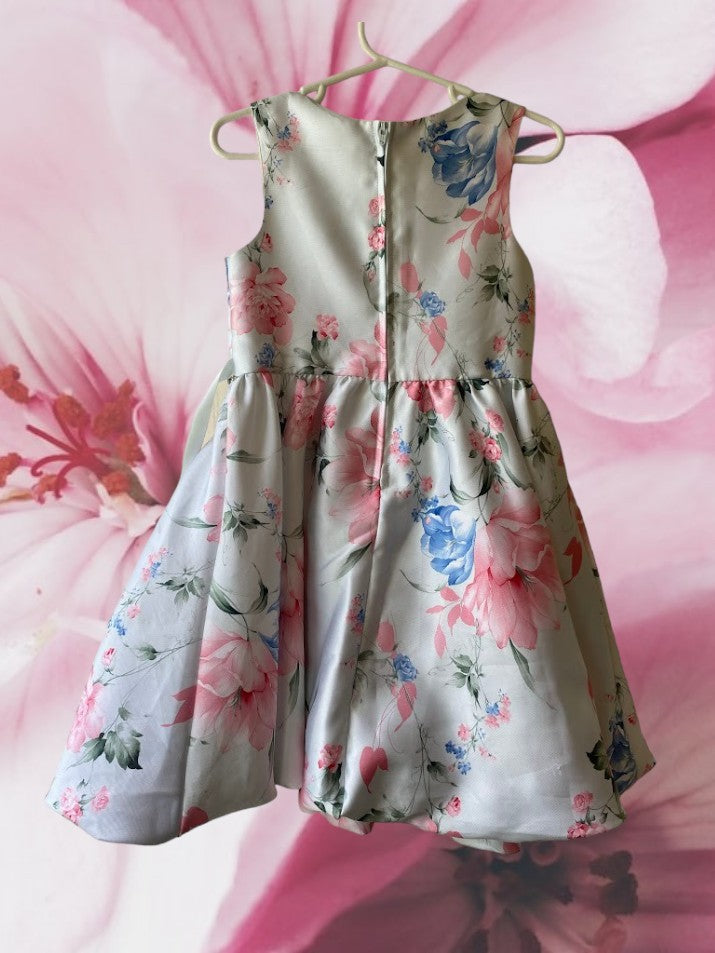 This summer party dress from Rare Editions features a lovely floral design