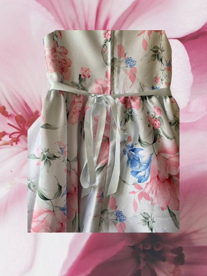 This summer party dress from Rare Editions features a lovely floral design