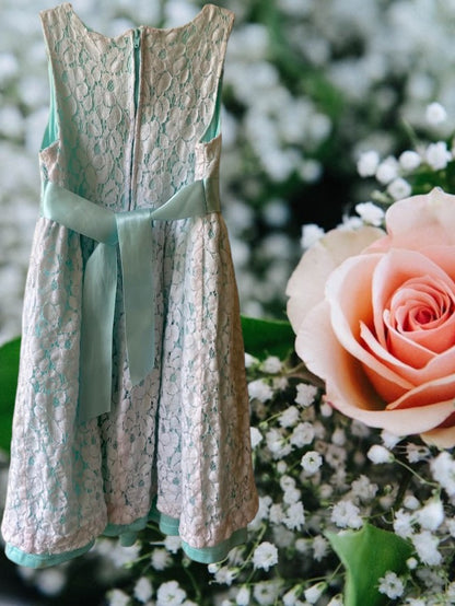 This Jessica Ann floral lace dress is the perfect choice for your little girl's next special occasion