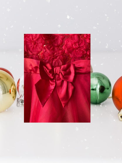 The Holiday Editions girl's sleeveless red floral dress features sequin floral decorations on the top and a front bow for a touch of elegance