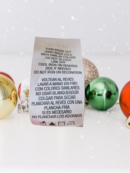 The Holiday Editions girl's sleeveless red floral dress features sequin floral decorations on the top and a front bow for a touch of elegance