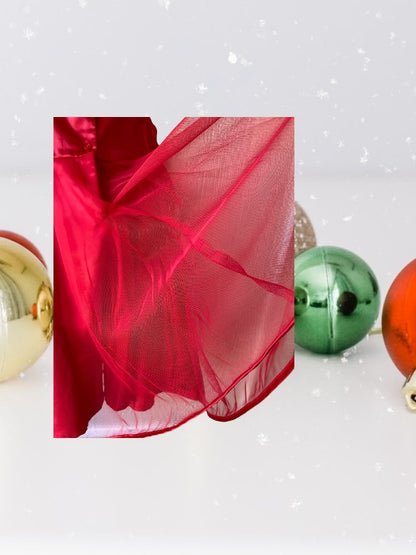 The Holiday Editions girl's sleeveless red floral dress features sequin floral decorations on the top and a front bow for a touch of elegance