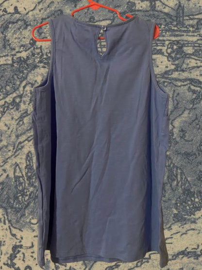 Sleeveless yoke tank top fitted on top and flowy on the bottom