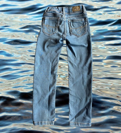 Experience unparalleled comfort and style with Jordache's distressed slim jeans