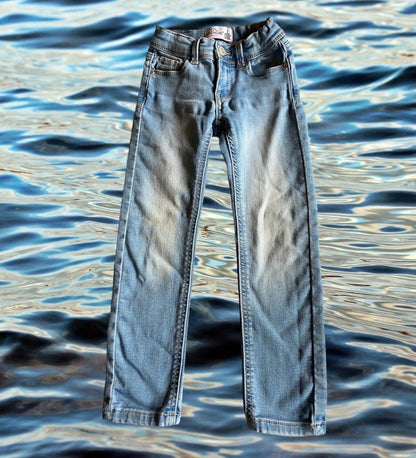Experience unparalleled comfort and style with Jordache's distressed slim jeans