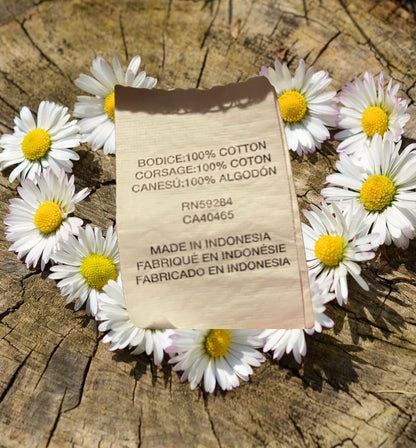 Add a pop of color and fun to any outfit with this stylish cotton tank top from The Children's Place