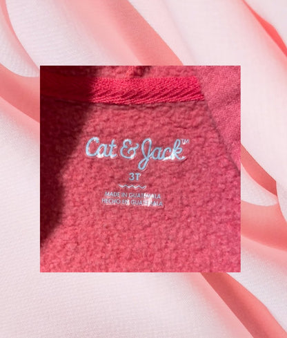 Keep your little one cozy on cool days with this adorable Cat & Jack hooded sweatshirt