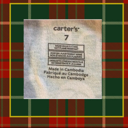 This Carter's pajama top features a festive Christmas pattern