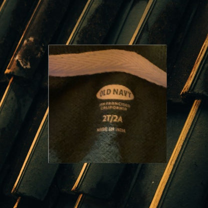 This comfortable cotton shirt from Old Navy features a classic collar and convenient pull over design